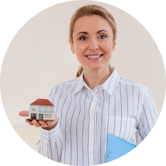 Woman holding a paper house
